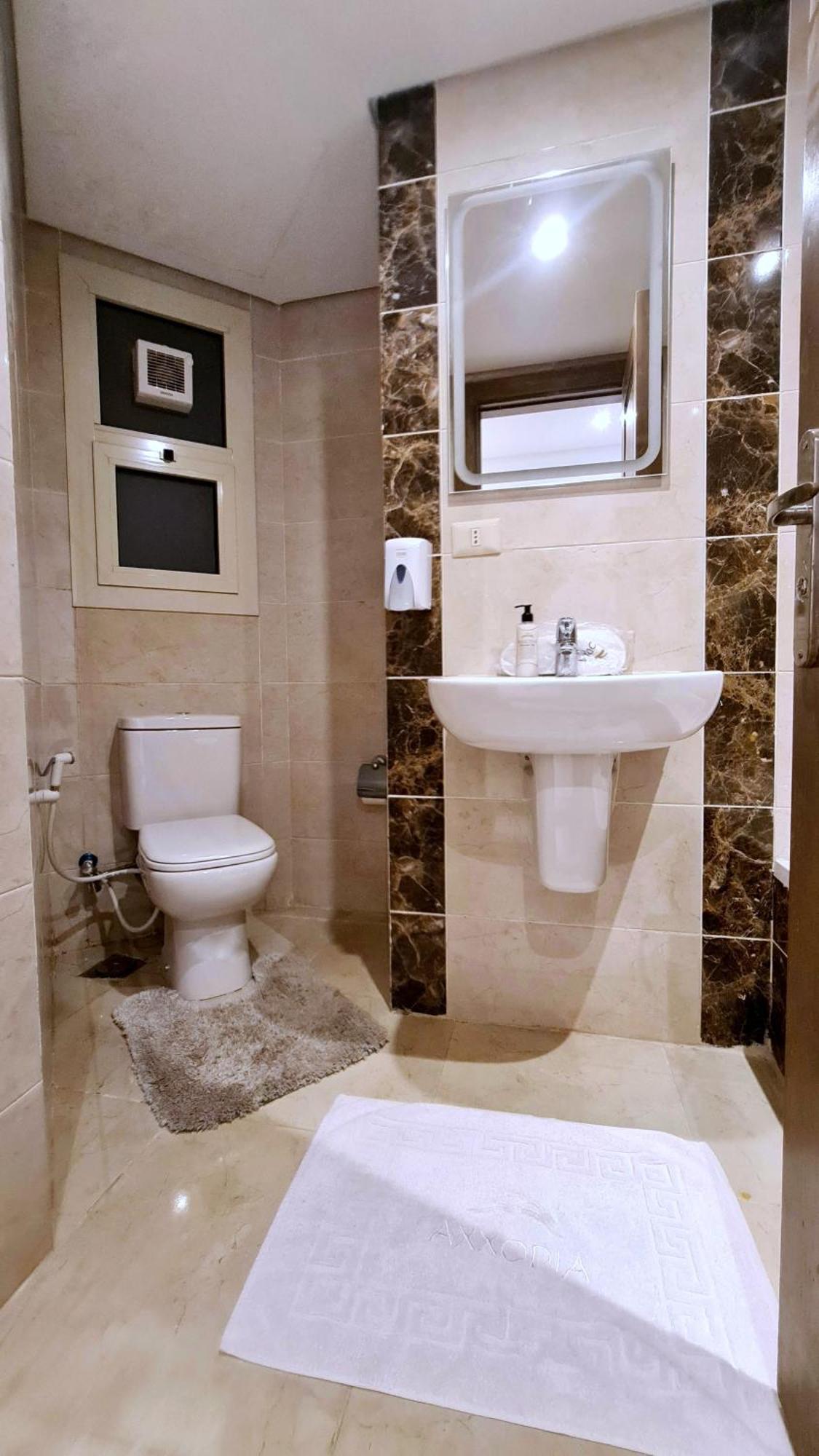 Axxodia- Duplex Porto New Cairoアパートホテル エクステリア 写真