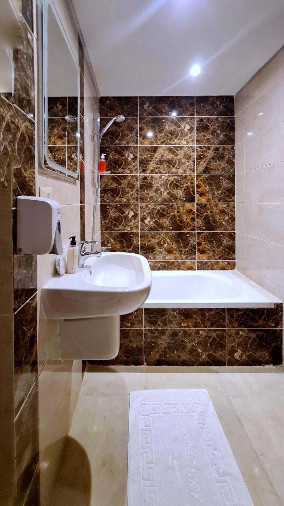 Axxodia- Duplex Porto New Cairoアパートホテル エクステリア 写真
