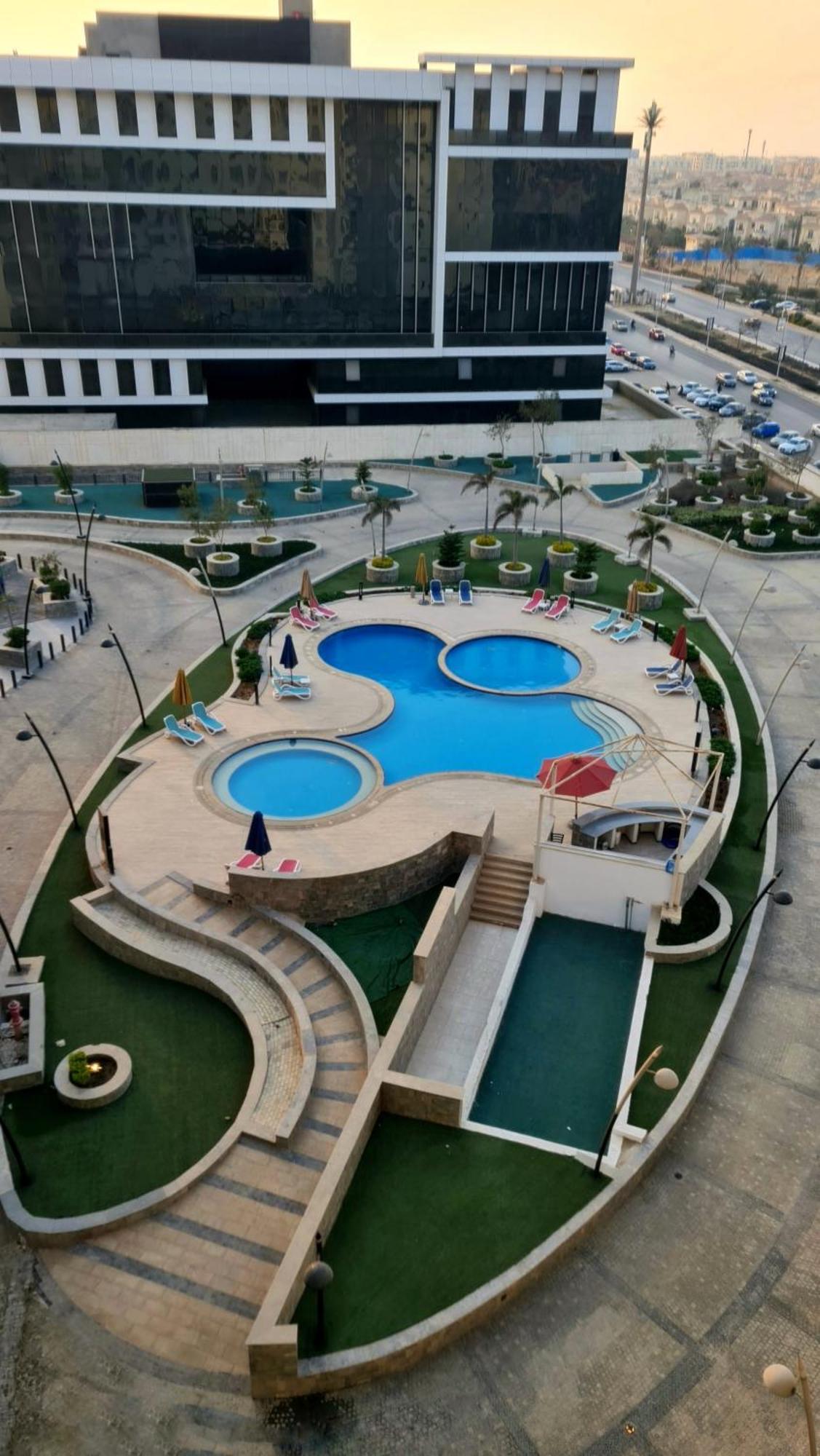 Axxodia- Duplex Porto New Cairoアパートホテル エクステリア 写真